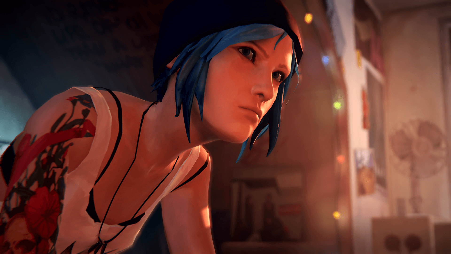 In-game screenshot of Chloe, a young woman with blue hair and tattoos