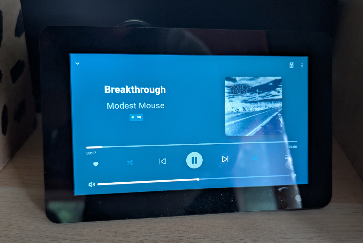 TouchKio display showing "Breakthrough" by Modest Mouse playing